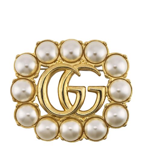 gucci double g brooch.